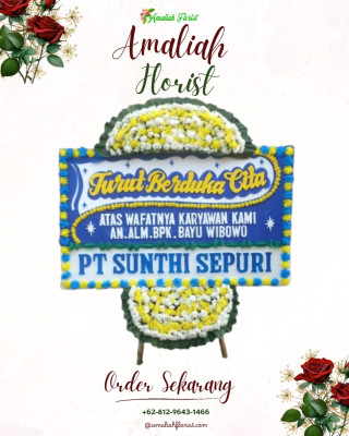 Papan Bunga Duka di Tampak Siring